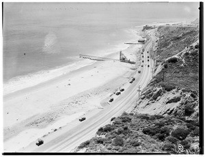 Birdseye view of the construction of a pier near Pacific Coast Highway between Santa Monica and Malibu