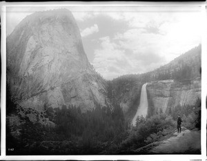 Man looking at Nevada Falls and Liberty Cap in Yosemite National Park, California, 1850-1930