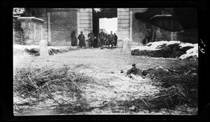 Group of soldiers standing outside a building in France during World War I, ca.1916