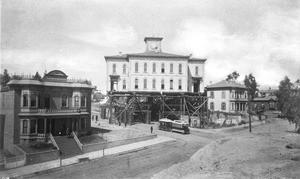 The first Los Angeles High School on North Broadway and Temple Street being moved to Sands Street, ca.1888