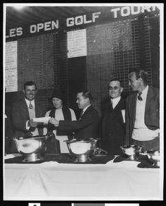 Los Angeles Open Golf winner Ed Dudley receiving his check at the Wilshire Country Club, 1931