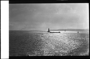 View of the breakwater and the Angeles Gate lighthouse in San Pedro Harbor, ca.1910