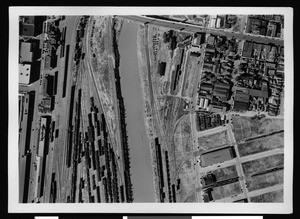 Aerial view of the Los Angeles River and the Santa Fe Railroad yards on its left bank, Los Angeles, 1938