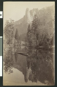 Sentinel Rock reflected in water in Yosemite National Park, ca.1900