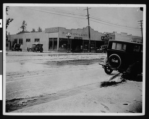 View of the corner of Hollywood Boulevard slushy with snow and water, January 21, 1912