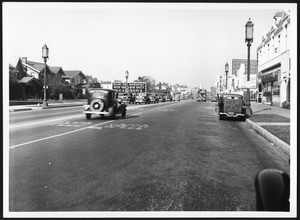 View of Wilshire Boulevard west, showing a double-decker bus, ca.1936