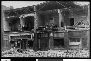 Earthquake damage in Inglewood, showing row of decimated structures, June 1920