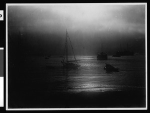 Boats in Avalon Harbor at night, ca.1900