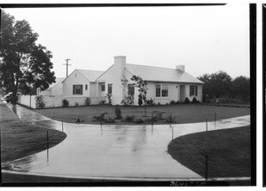 Exterior view of a house on a street corner in Los Angeles