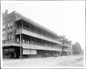 A building and street in Visalia, Tulare County, California, 1900-1940