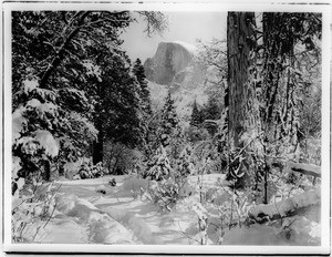 Yosemite Valley and Half Dome covered in snow, Yosemite National Park, California, ca.1850-1930