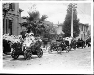 The auto section of Los Angeles' La Fiesta parade, showing Miss Clark, 1906