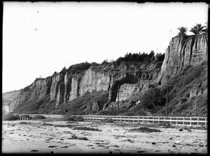 View of the cliffs at Santa Monica's Palisades Park from the beach, ca.1910