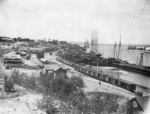 View of Nob Hill, showing homes and the shipyard along the harbor point, ca.1890