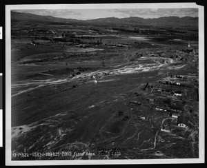 Birdseye view of houses caught in a Tujunga flood, 1938