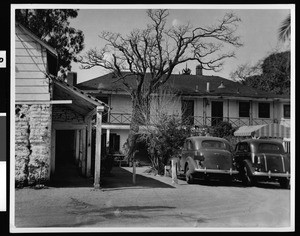 Exterior view of the Francisco Castro adobe in El Cerrito, shown from the patio, ca.1900