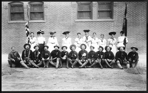 Portrait of veterans "Teddy's Terrors" along with the Ladies Auxiliary, ca.1904