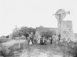 A family posing in front of old Riviere (or Reviera?) Adobe, west of Jefferson and St. Andres, ca.1878