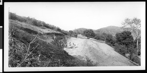 Workers digging a roadbed through the hills behind East Whittier, ca.1914