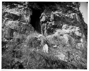 Barker the Black Hills Hermit at his cave, ca.1900