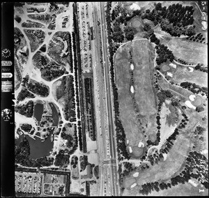 Aerial view of Century City showing a golf course and a marina, May 6, 1959