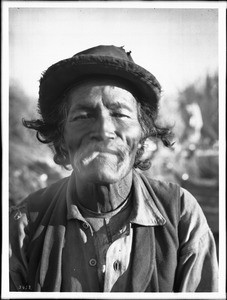 Portrait of an old Chemehuevi Indian man smoking, ca.1900