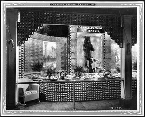 Citrus exhibit in Toronto shows a bear, hundreds of oranges and a painting by Chris Siemer of Los Angeles, 1927