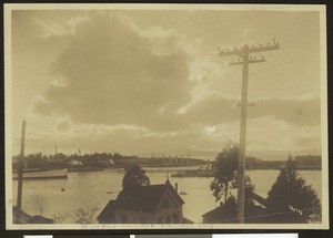 Winter sunset overlooking homes and a lake in Vallejo in Solano County, California, ca.1900