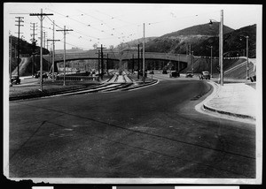 View of a grade separation over a street and railroad tracks, ca.1930-1949