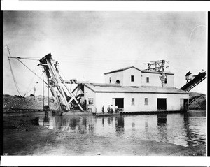 A gold dredge at work, Feather River, California, ca.1900