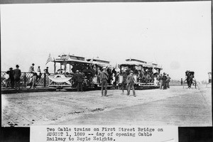 Streetcars and spectators on the First Street Bridge during the opening of the cable railway to Boyle Heights, Los Angeles, August 1, 1889