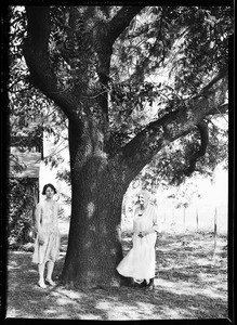 Mrs. Purcell and her mother by an old adobe house in San Gabriel, June 1930