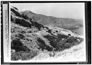 Caterpillar Sixty pulling a Russell Super Mogul on new road around northern end of Catalina Island, ca.1930