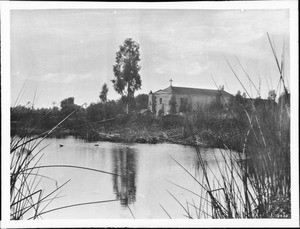 Rear of Mission San Gabriel with pond