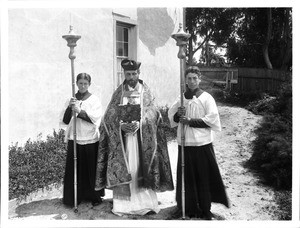 Father Raymond Mestres in a procession at Mission San Carlos, Monterey, ca.1900