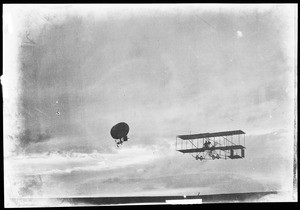 French aviator Louis Paulhan aloft in the night sky at the Dominguez Hills Air Meet (Phoenix, Arizona?), ca.1915