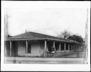 Exterior view of the home of Don Antonio Mario Lugo, of adobe built in 1820 on San Pedro Street, near Second Street, Los Angeles, ca.1885