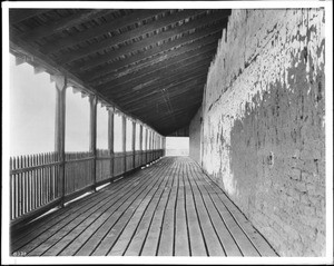 Upper porch along the rear of General Vallejo's Casa Grande, in Pedaluma, California, ca.1900