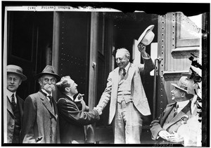 Admiral Hugh Rodman shaking hands with members of the Los Angeles Chamber of Commerce