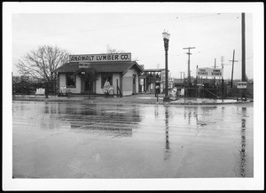 Exterior view of the Anawalt Lumber Company on a rainy day, February 15, 1934