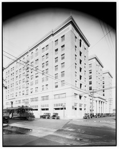 Automobiles parked in front of the Chamber of Commerce building in Los Angeles