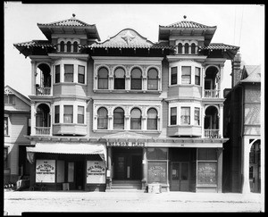 Exterior view of the Nelson Flats apartments and candy factory on Fourth Street in Los Angeles