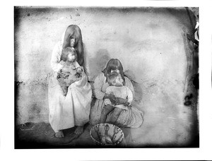 Two Pima Indian mothers, Nellie Law and Lulu Gage, each holding a baby, 1904