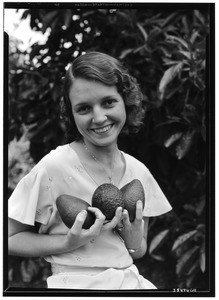 Miss Margaret Thornton with Calavo avocados, May 1932