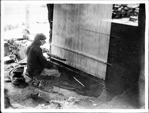 Hopi Indian man weaving a blanket, ca.1900