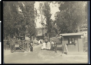 People standing at the entrance of the Municipal Campground in Elysian Park, ca.1900