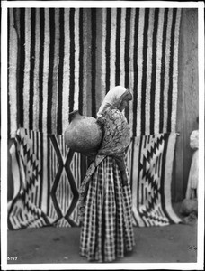 Young Walapai Indian woman water carrier, Hackbury, Arizona, ca.1900