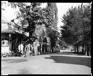 View down an unidentified street in Columbia, California, ca.1930 (1894?)