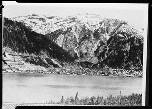 Densely populated community along a large mountain base, Alaska, 1935