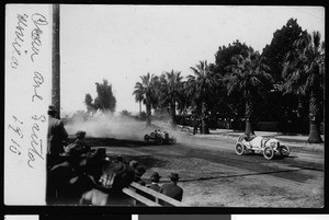 A crowd watching an automobile race near Ocean Avenue in Santa Monica, 1910
